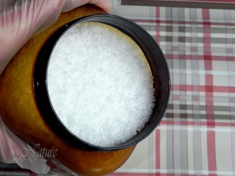 Container with sodium hydroxide beads