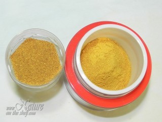 Homemade orange zest powder in jars
