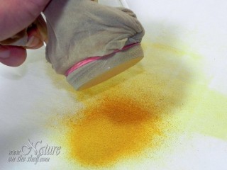 Sifting the fine orange zest powder